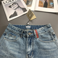 Denim shorts with towel embroidery on the back pockets