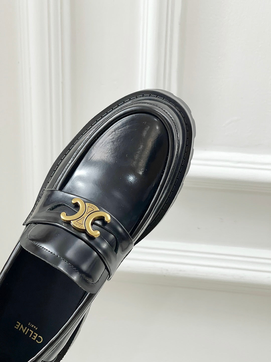 Thick-soled Arc de Triomphe loafers