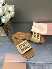 Raffia woven leather half-slippers