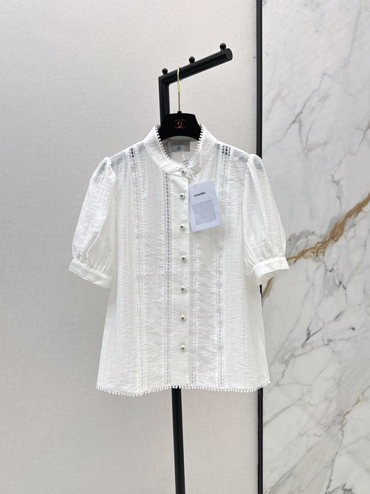 White shirt decorated with embroidered lace