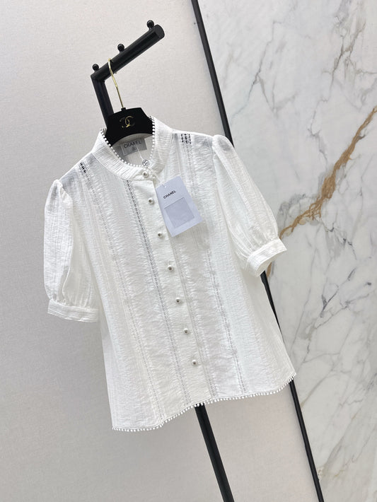White shirt decorated with embroidered lace