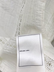White shirt decorated with embroidered lace