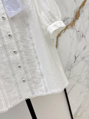 White shirt decorated with embroidered lace
