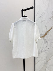 White shirt decorated with embroidered lace