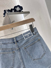 Camellia embroidered denim shorts