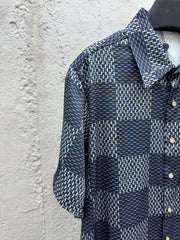 Cross-stitched leather jacket