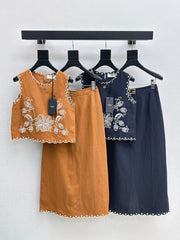Sleeveless vest + skirt