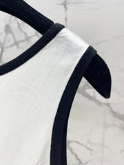 Button design three-dimensional bow knitted vest