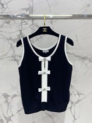 Button design three-dimensional bow knitted vest