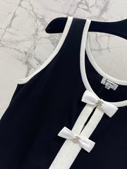 Button design three-dimensional bow knitted vest