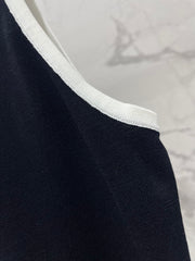Button design three-dimensional bow knitted vest