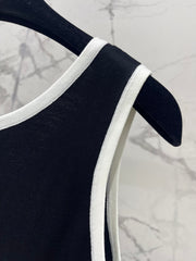 Button design three-dimensional bow knitted vest
