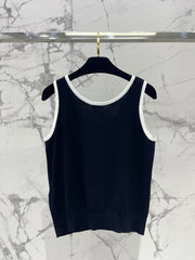 Button design three-dimensional bow knitted vest