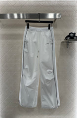 Casual baseball jacket and trousers set.