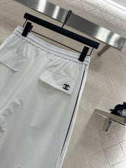 Casual baseball jacket and trousers set.