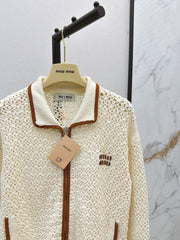 Hand-crocheted jacket with vintage suede patchwork