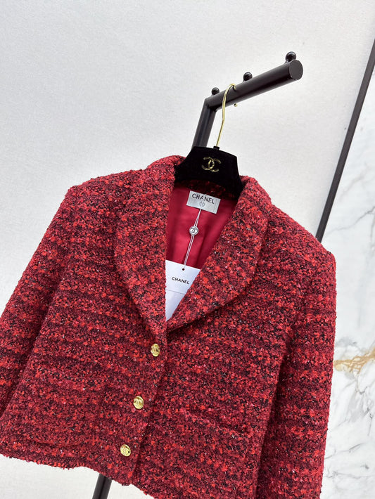 A red woven jacket with a Christmas vibe