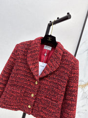 A red woven jacket with a Christmas vibe