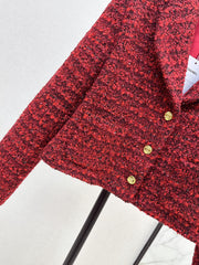 A red woven jacket with a Christmas vibe