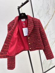 A red woven jacket with a Christmas vibe