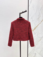 A red woven jacket with a Christmas vibe