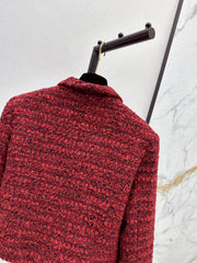A red woven jacket with a Christmas vibe