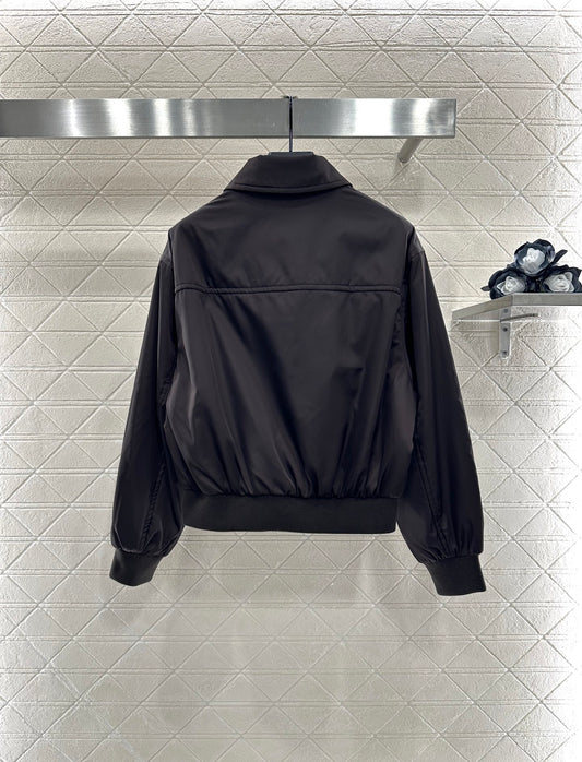 Zippered jacket with padded outerwear.