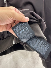 Zippered jacket with padded outerwear.