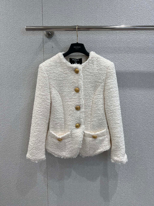 Gold-buttoned, slim-fit cropped tweed jacket.