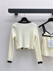 Two-Piece Cardigan and Suspender Set
