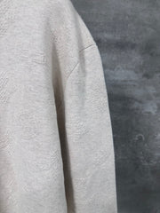 Embossed pattern sweater