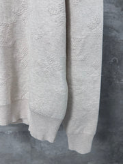 Embossed pattern sweater