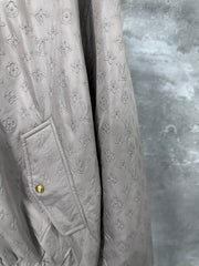 All-over embossed logo jacket