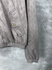 All-over embossed logo jacket