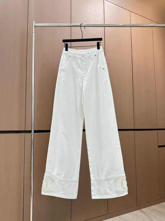 Handmade pearl-embellished jeans
