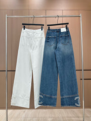 Handmade pearl-embellished jeans