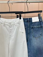 Handmade pearl-embellished jeans