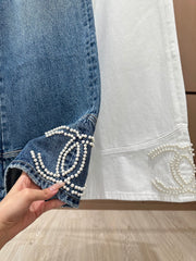 Handmade pearl-embellished jeans