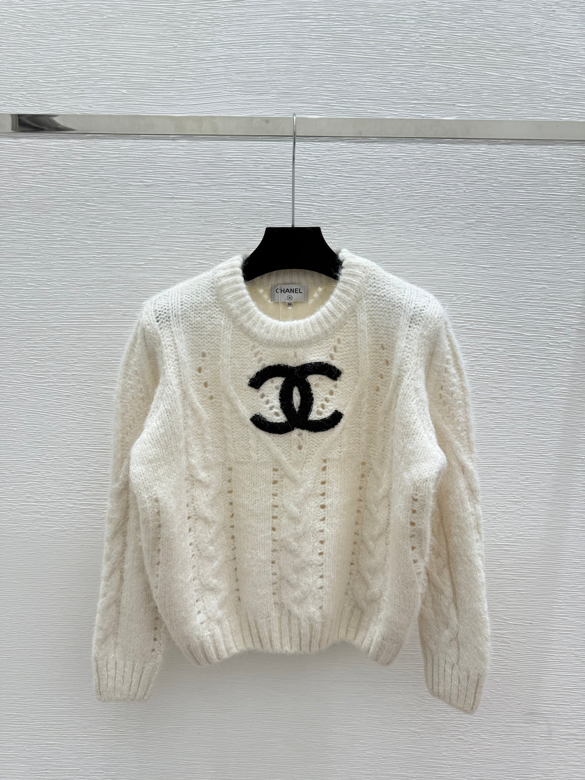 Solid color simple hollow round neck knitted long sleeves