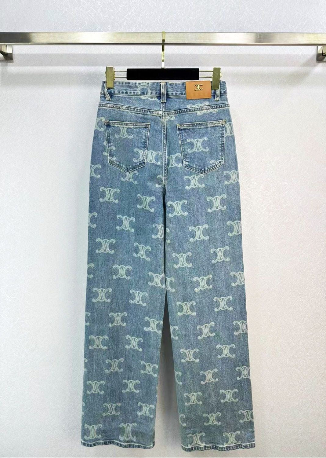 Jeans with two pockets all over print