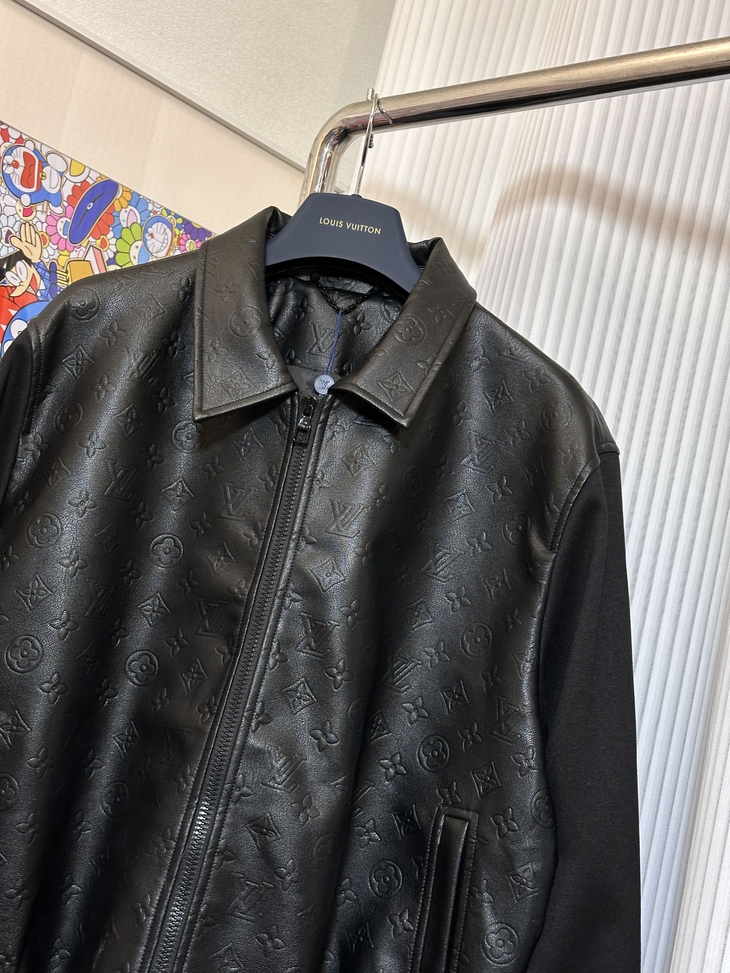 Paneled leather long-sleeved jacket