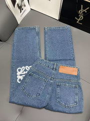 Jeans with embroidered logo at knee