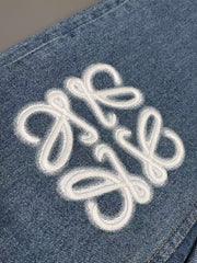 Jeans with embroidered logo at knee