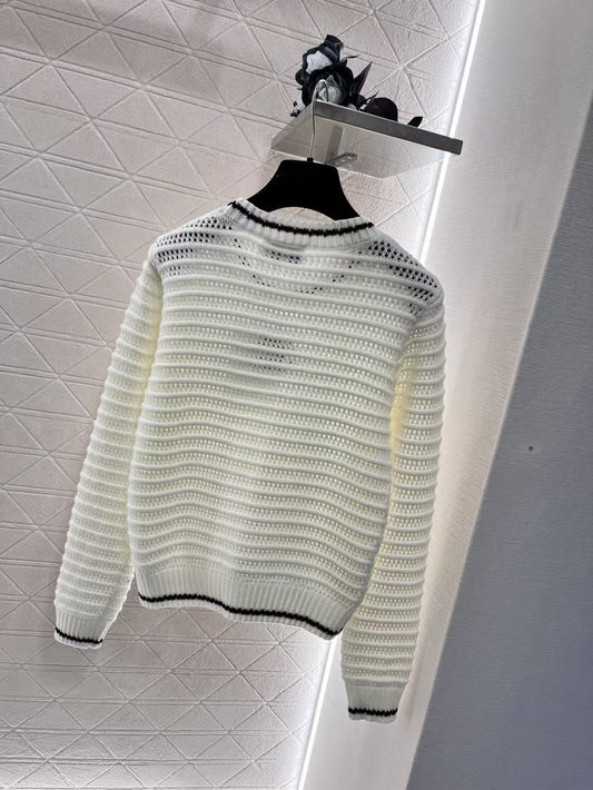 Round neck hollow crocheted long-sleeved sweater