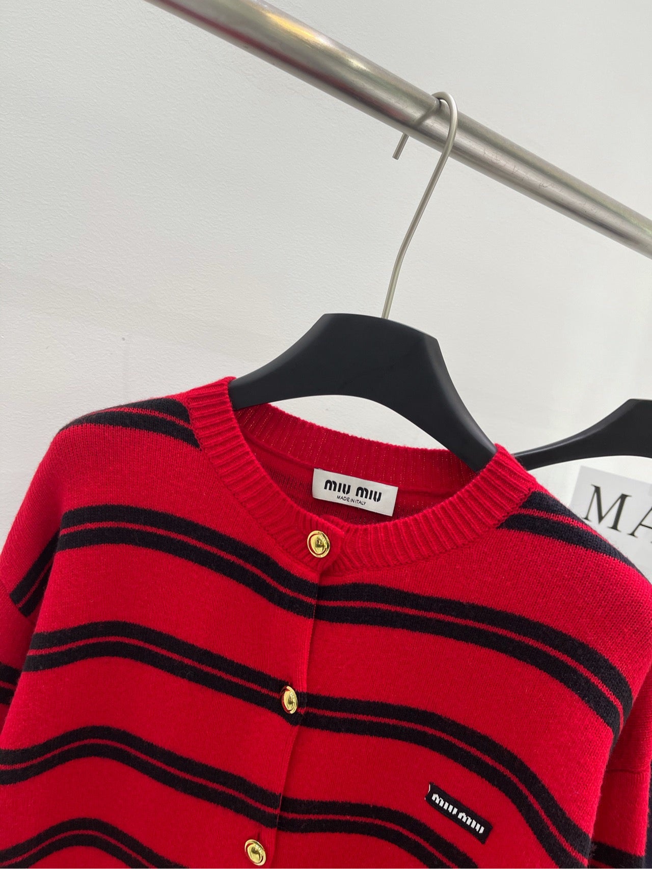 Red and black wide stripes with gold buttons