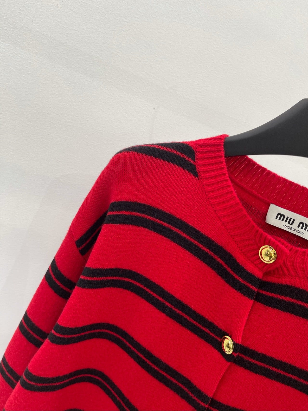 Red and black wide stripes with gold buttons