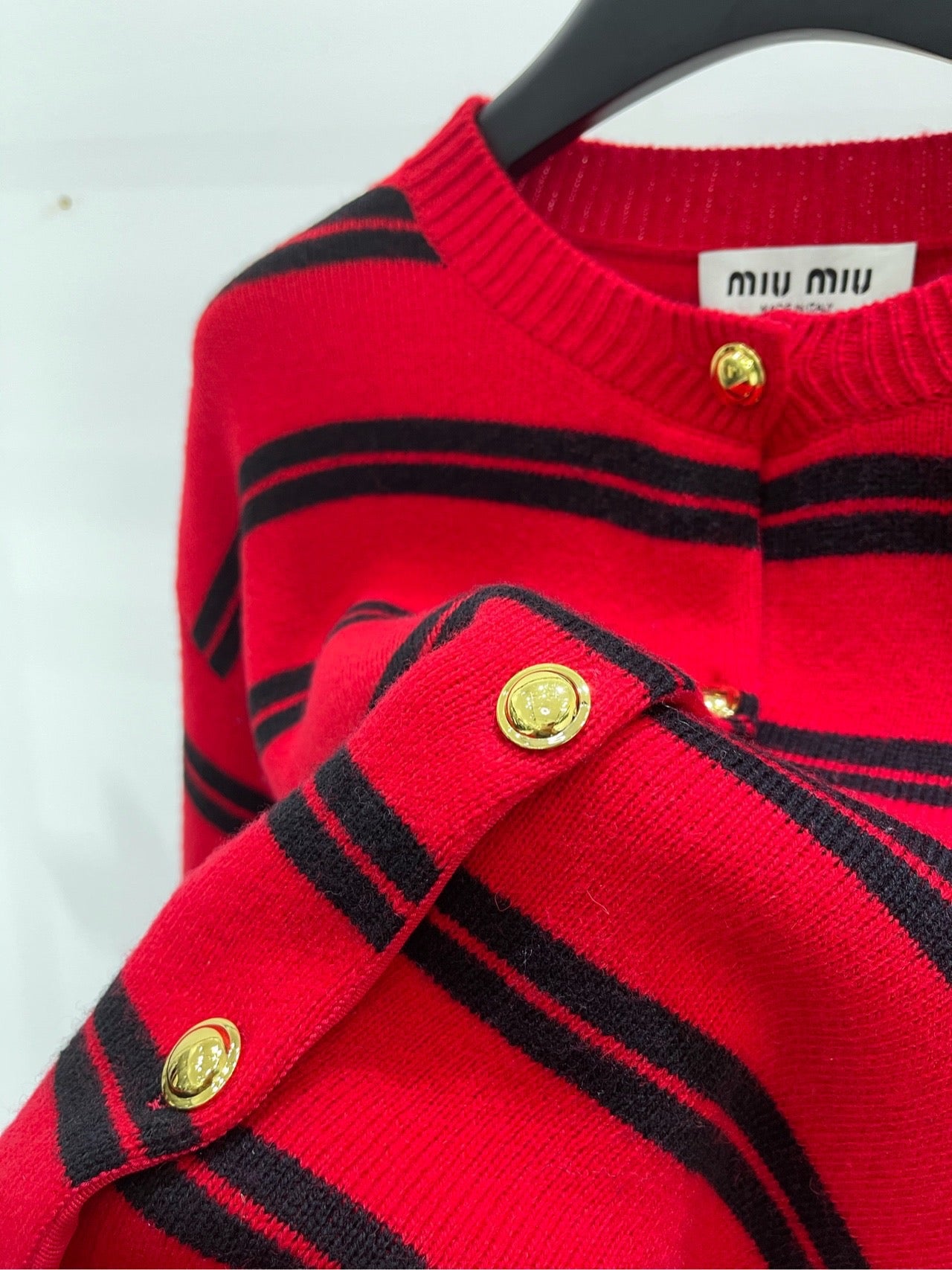 Red and black wide stripes with gold buttons